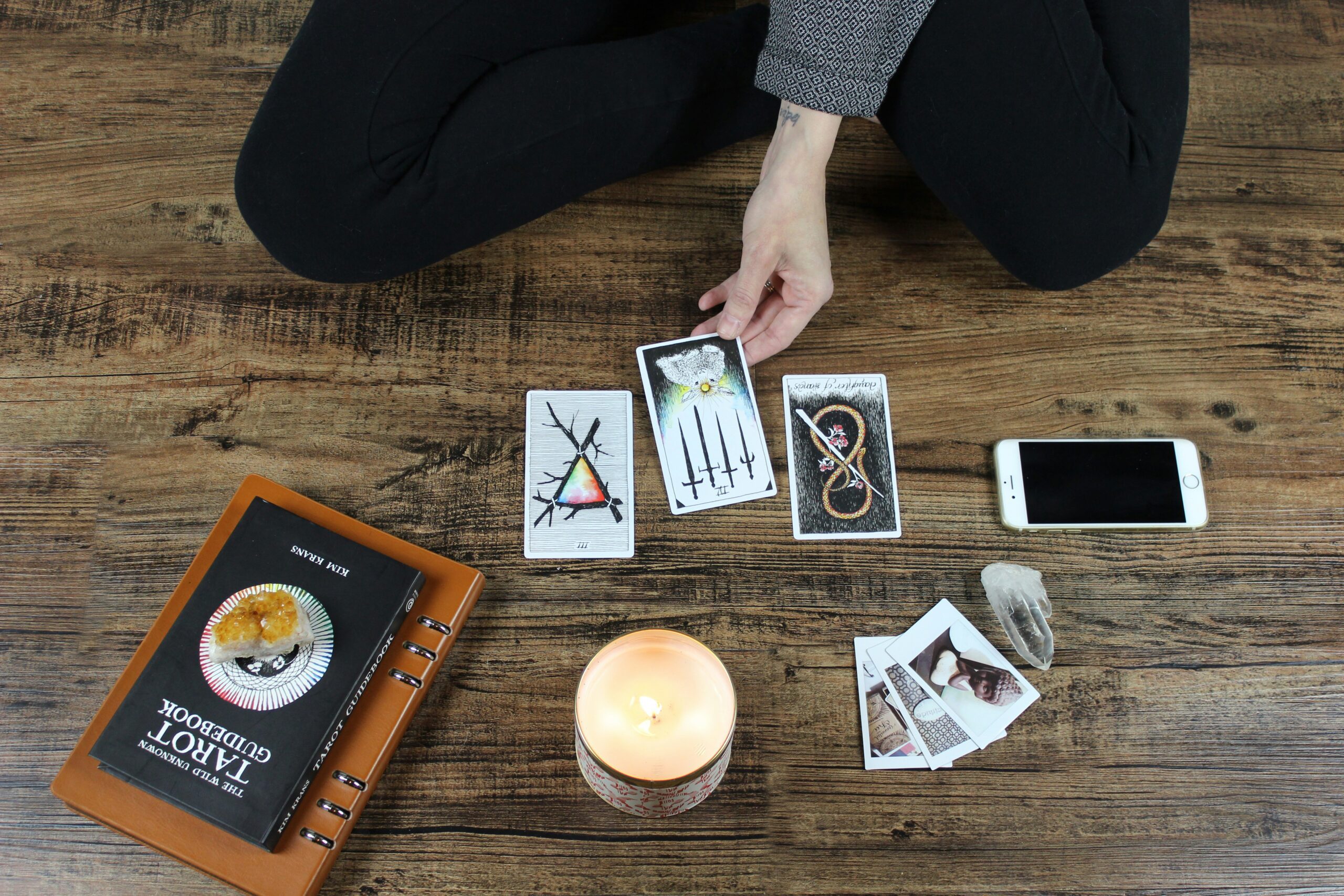 person playing with tarrot cards